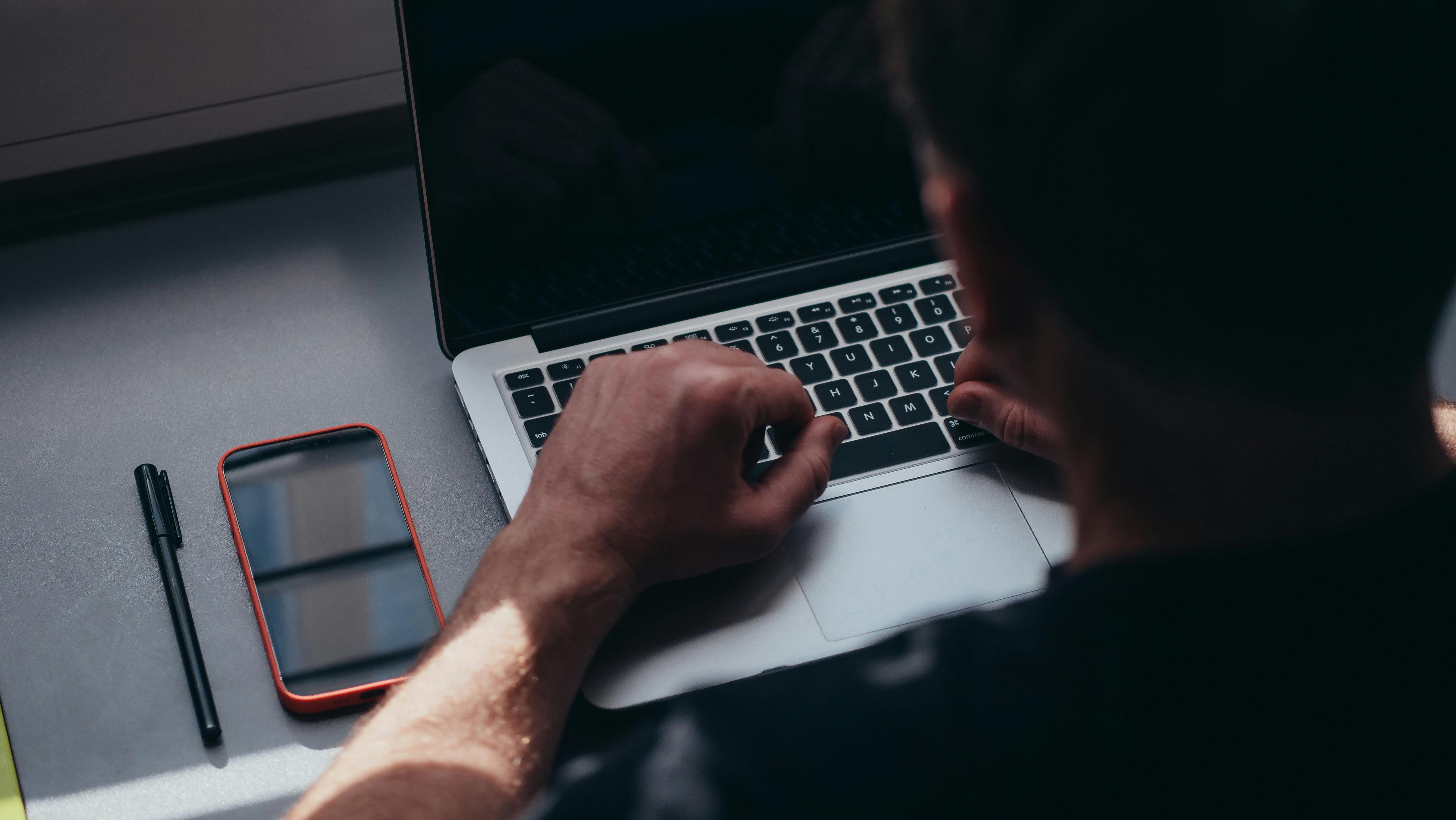 Photo by Kindel Media: https://www.pexels.com/photo/a-man-using-a-laptop-7054515/